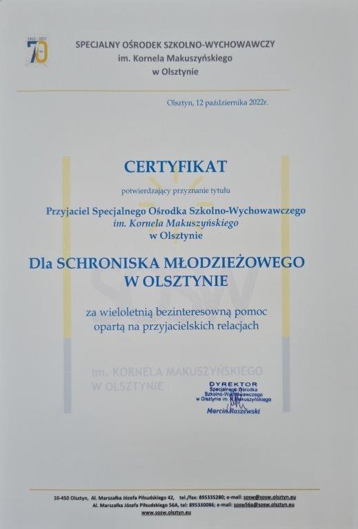 Urkunde für die Schuljugendherberge in Olsztyn, die die Verleihung des Titels bestätigt: Freund der Sonderschule und des Bildungszentrums in Olsztyn (Allenstein)  